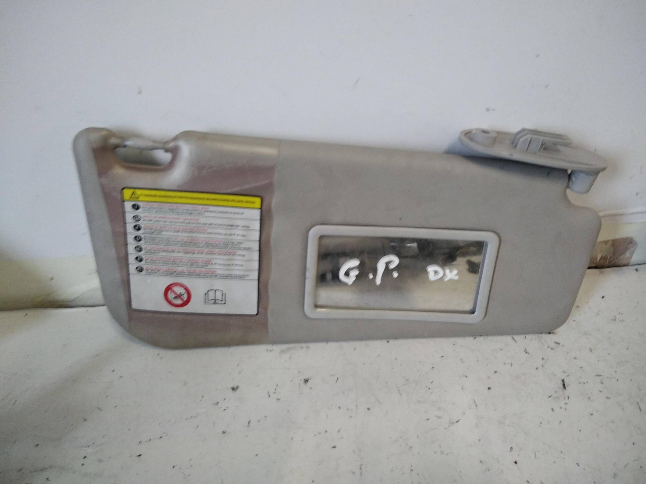 Aletta parasole parabrezza dx.